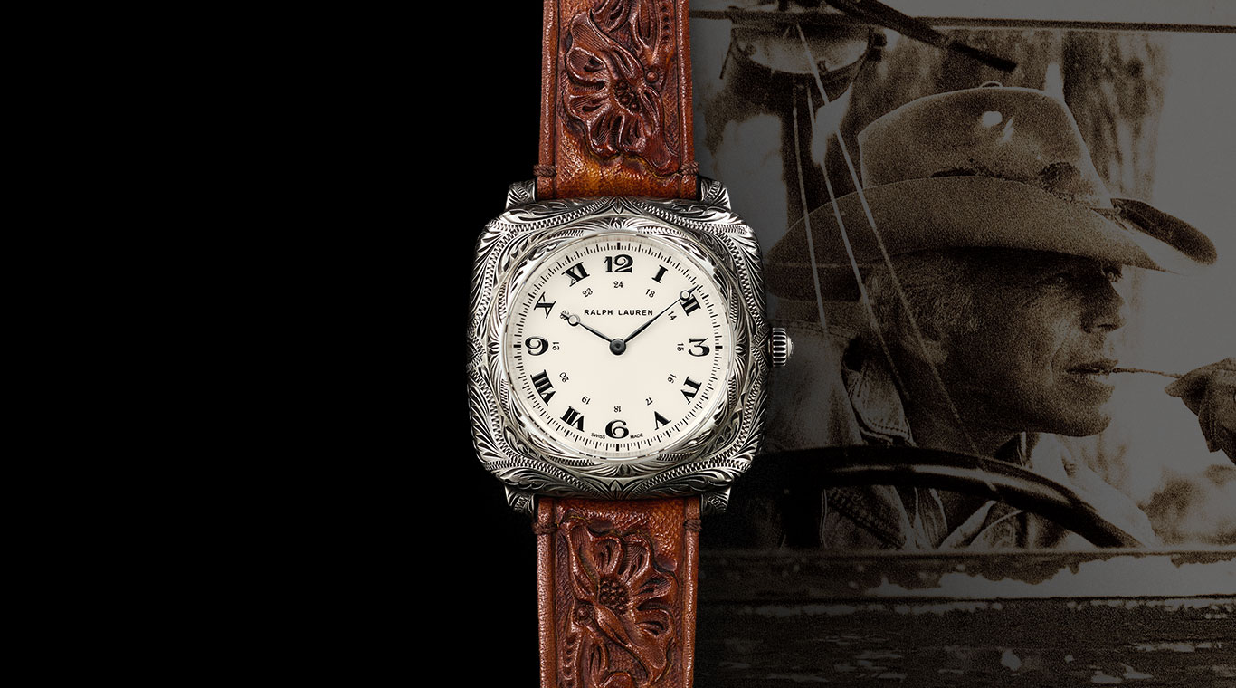 Watch with intricate engraving & hand-tooled leather strap