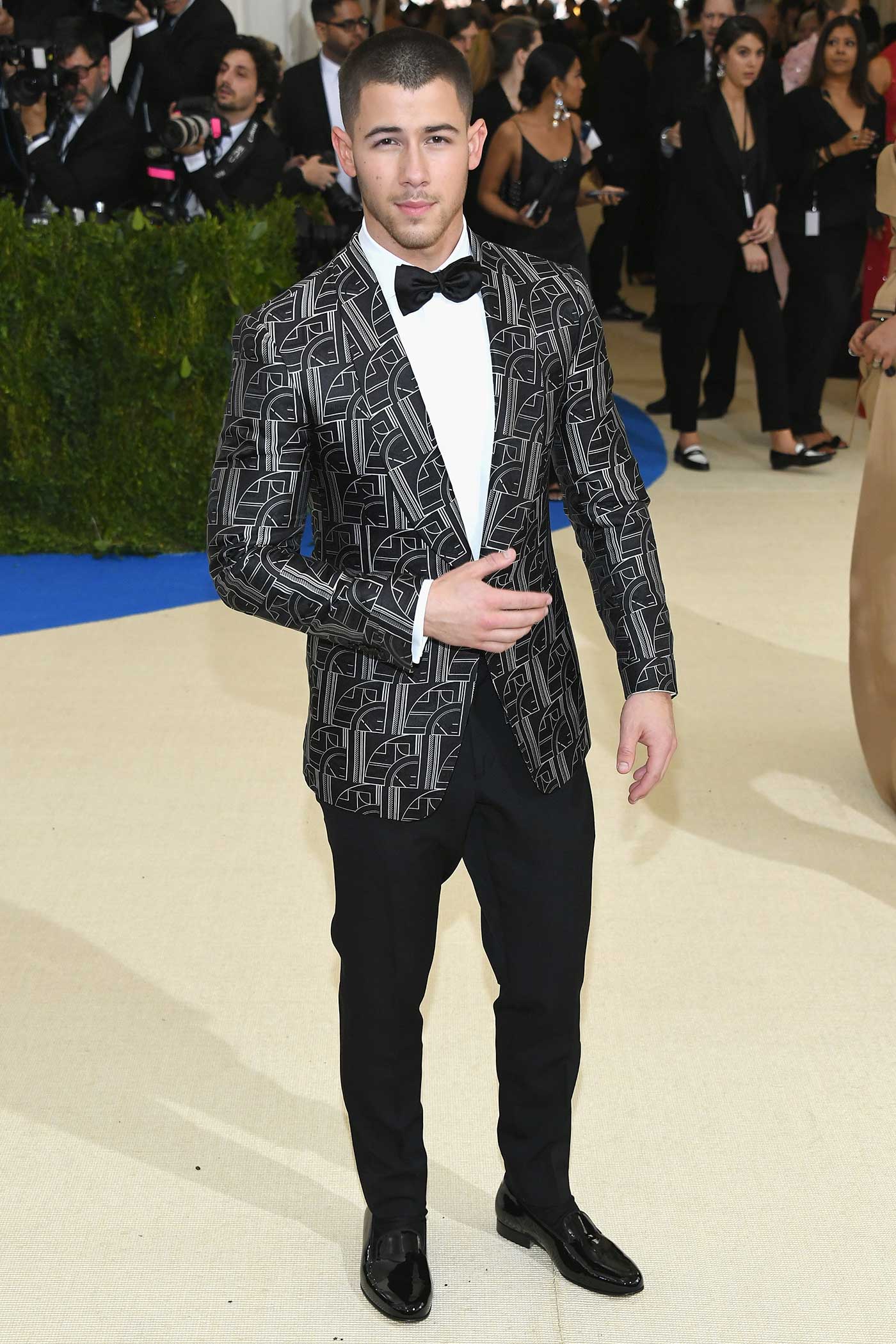Nick Jonas wore a graphic, Art Deco&#x2013;inspired jacquard dinner jacket and tuxedo pants from Ralph Lauren Purple Label