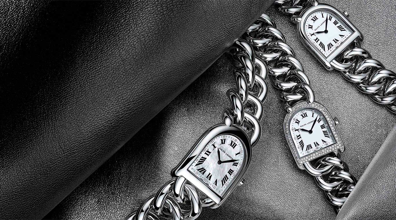 Stirrup-inspired watches with silver chain-link straps