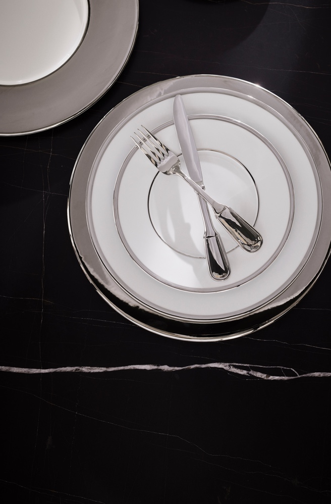 White porcelain plates with painted silver bands