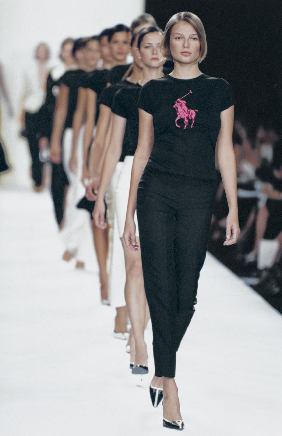  A parade of models, including Bridget Hall (front), unveils the first Pink Pony tee at the Spring 2002 Ralph Lauren Collection Runway Show in September 2001