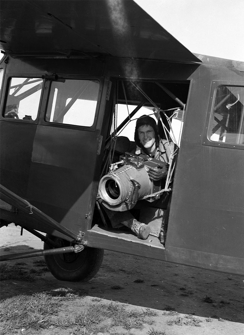 Bradford Washburn with his Fairchild K-6 camera in Valdez, Alaska (1937)