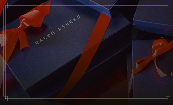 Navy Ralph Lauren gift box tied with red ribbon
