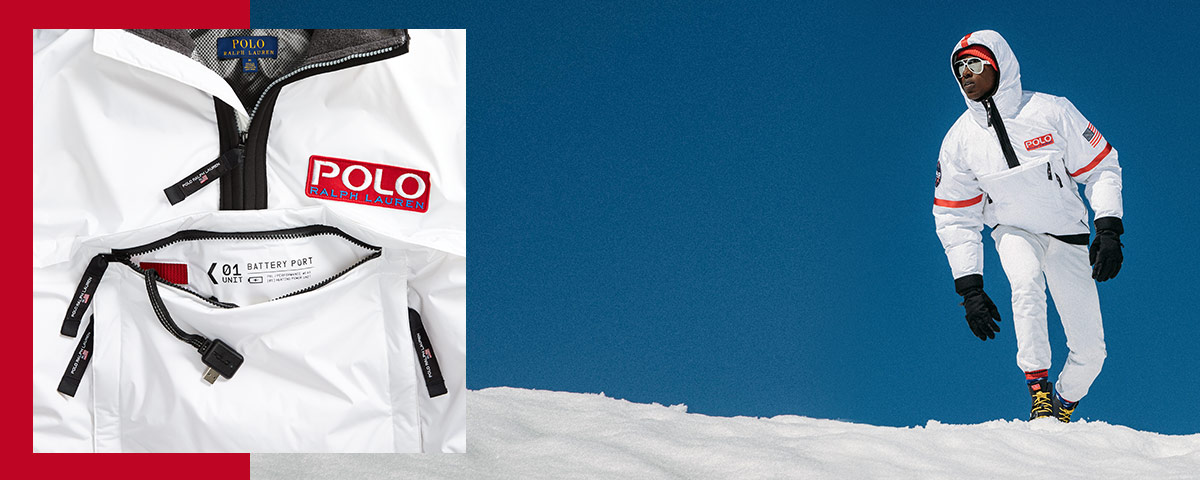 Man in snow wearing white Polo 11 jacket