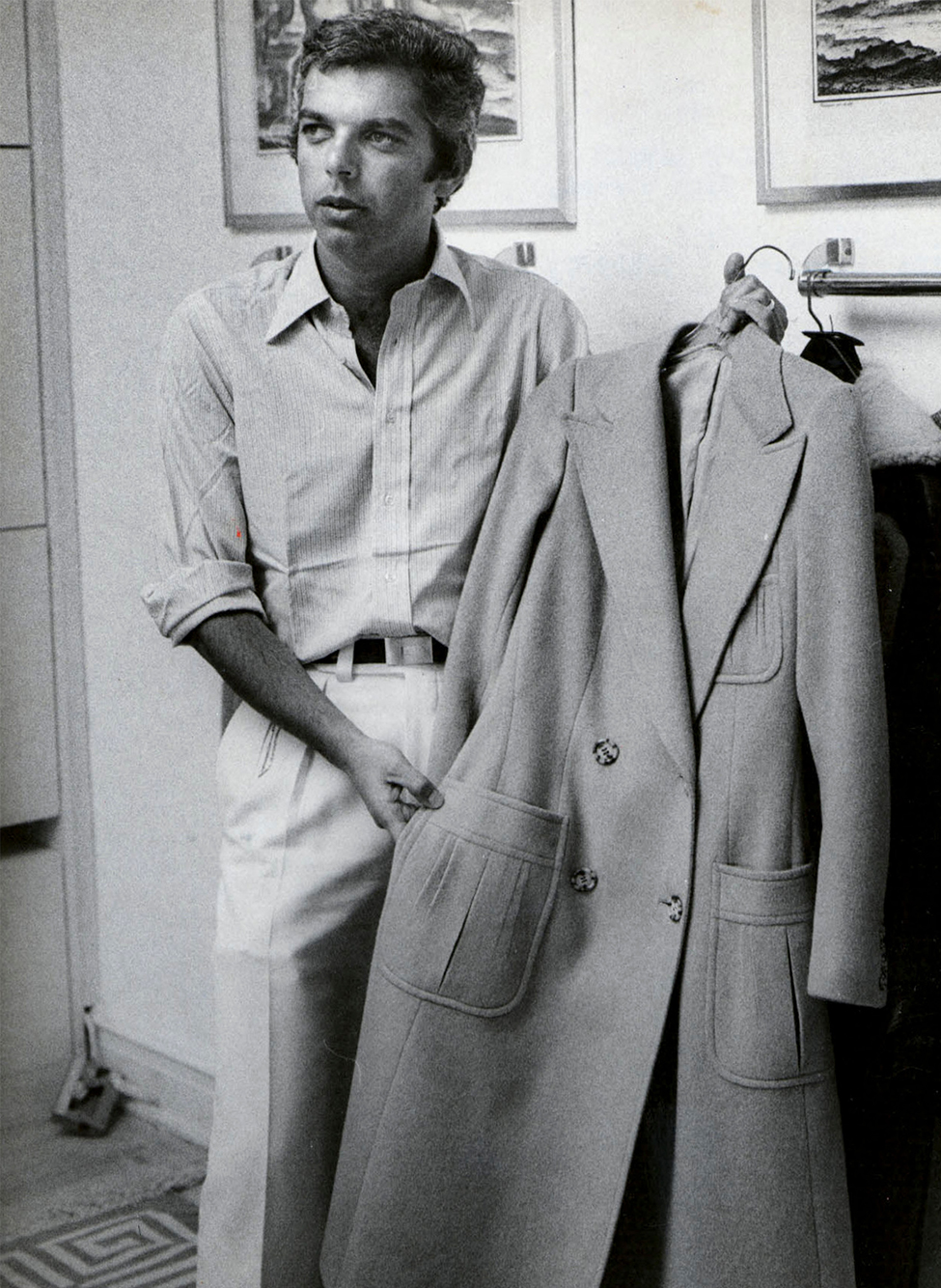Ralph Lauren in the ’70s with his iconic polo coat, which was to become one of the brand’s signature classics