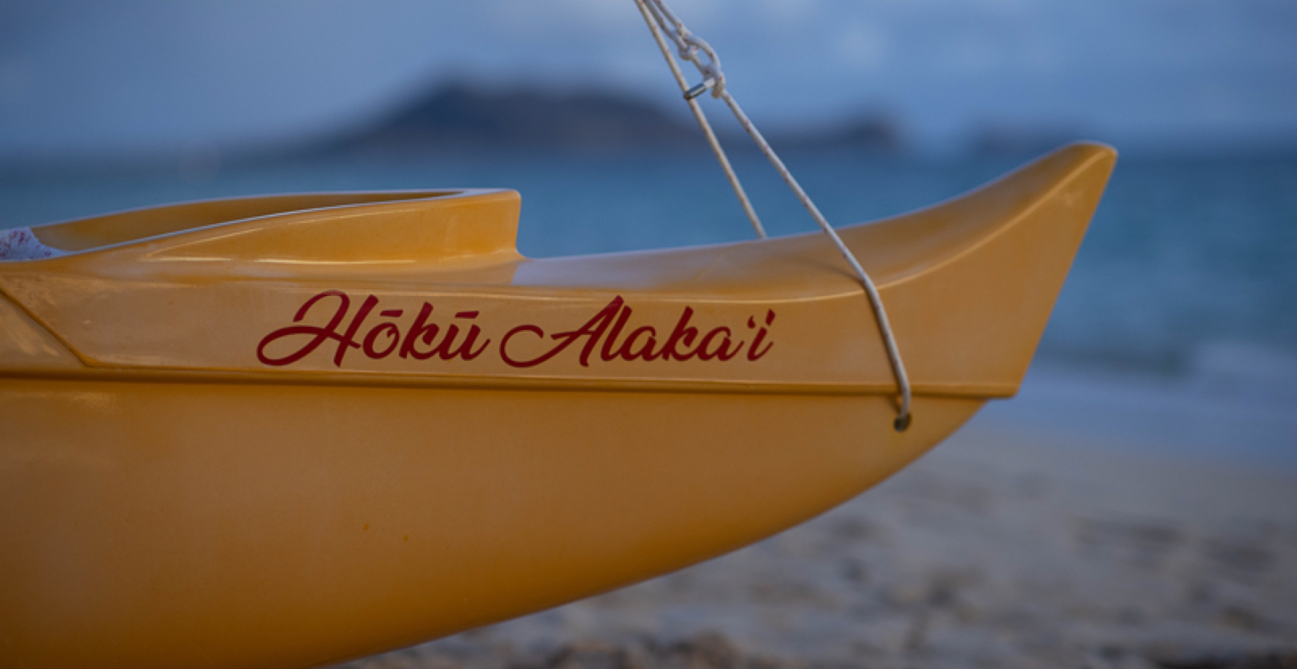 Both Hopena’s own boat and the famous Hōkūleʻa use the Hawaiian word <em>hōkū</em>, which translates to “star”—a reference to the ancient practice of celestial navigation that is fundamental to traditional Polynesian sailing. 