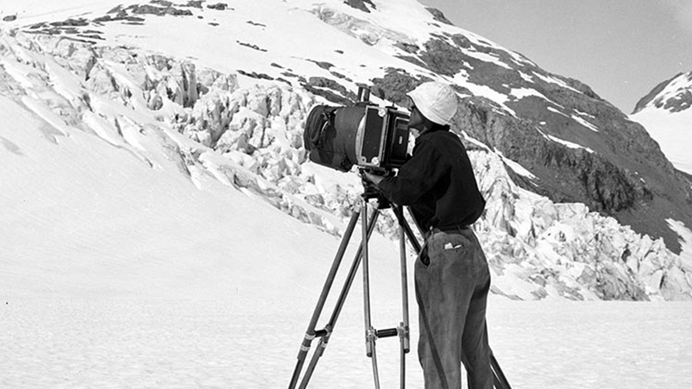 Washburn with his camera during an expedition to Mt. Bertha, Alaska (1940)