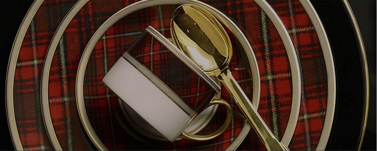Table setting featuring a bright red plaid motif