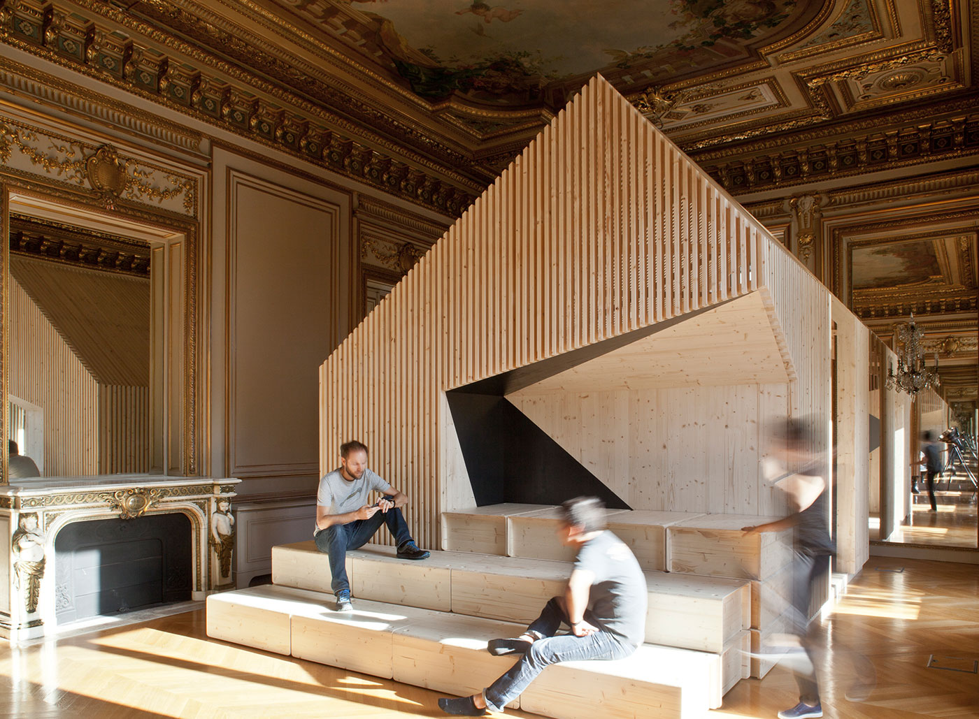 <strong>EKIMETRICS: PARIS | </strong>Estelle Vincent Architecture erected standalone wooden structures to serve as private meeting spaces in the gilded offices of this consulting firm on the Champs-&#xC9;lys&#xE9;es