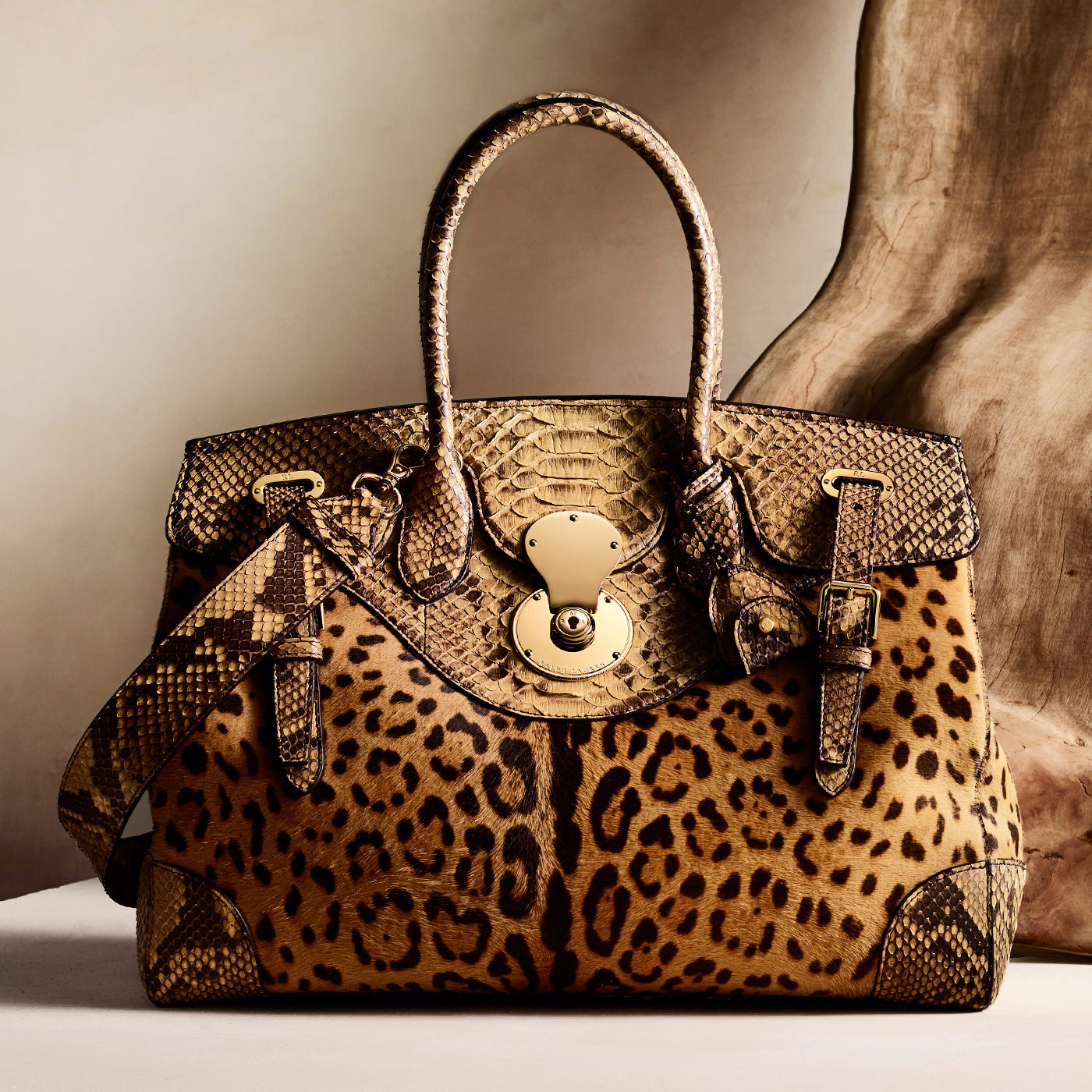     <p><span>A signature Ralph Lauren silhouette, the Ricky creates a dynamic play between texture and pattern using leopard-print haircalf and exotic python</span></p>  