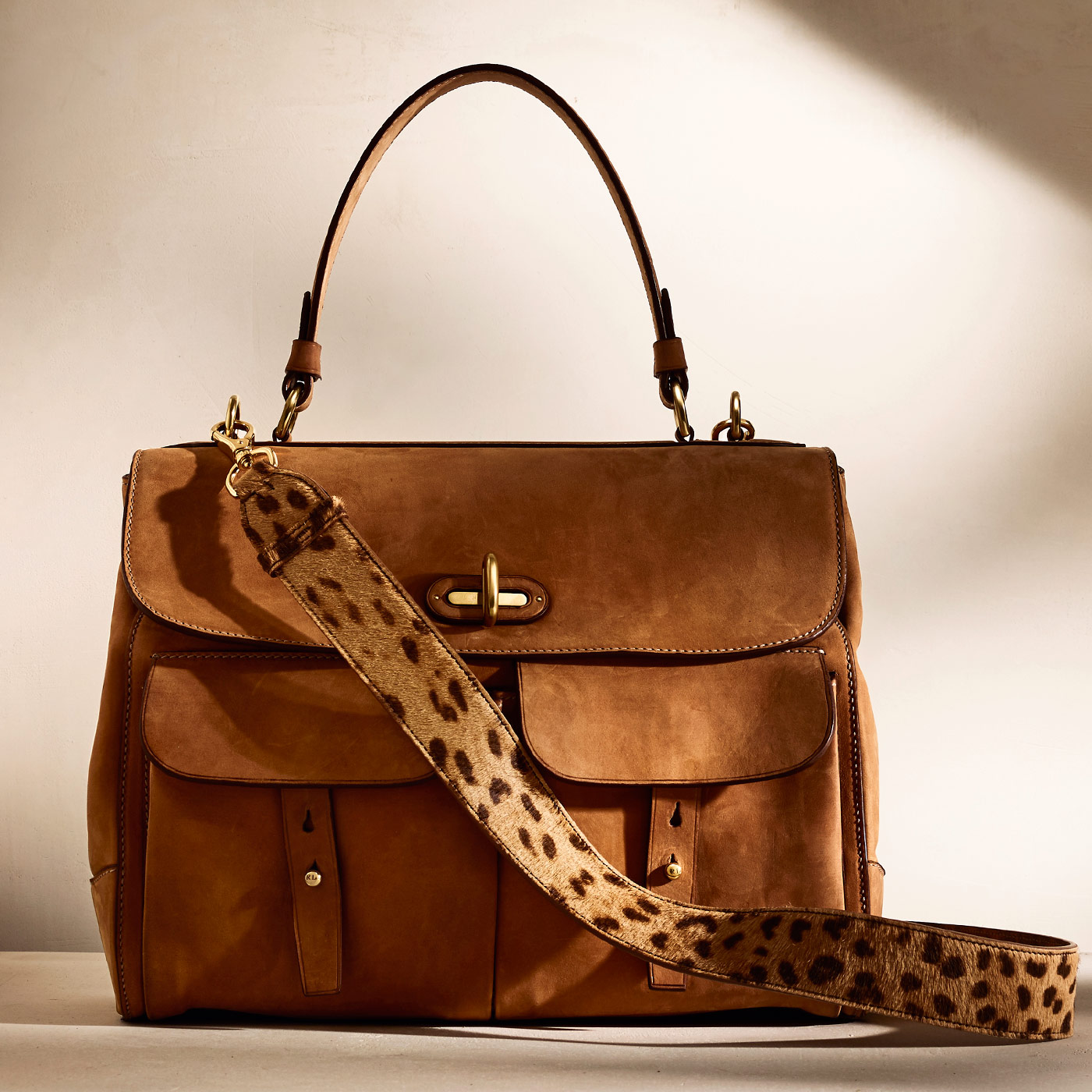     <p><span>Crafted from natural calfskin, the Tiffin is vegetable-tanned and buffed by skilled artisans to achieve the velvety texture of suede</span></p>  