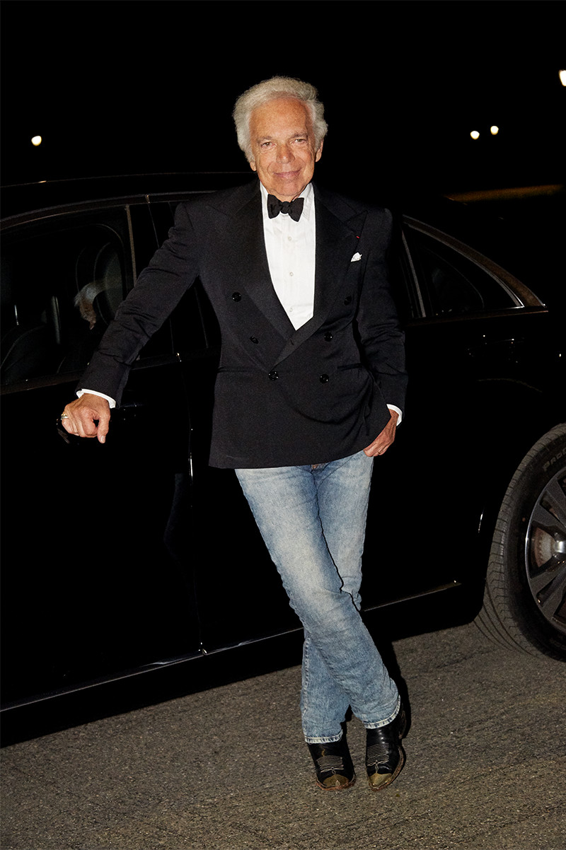 Ralph Lauren, in his signature jeans-and–a dinner jacket look, arrives at his 50th Anniversary Show in Central Park