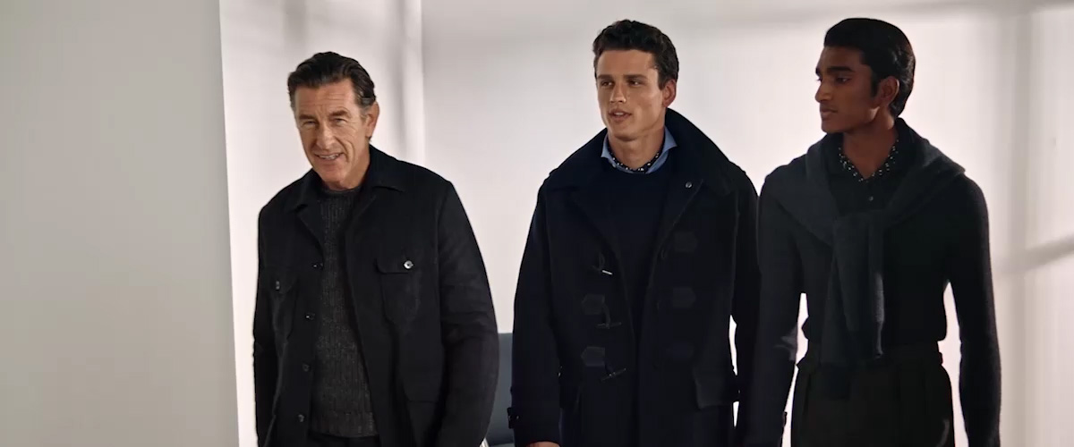 Men in grey & navy sweaters & coats