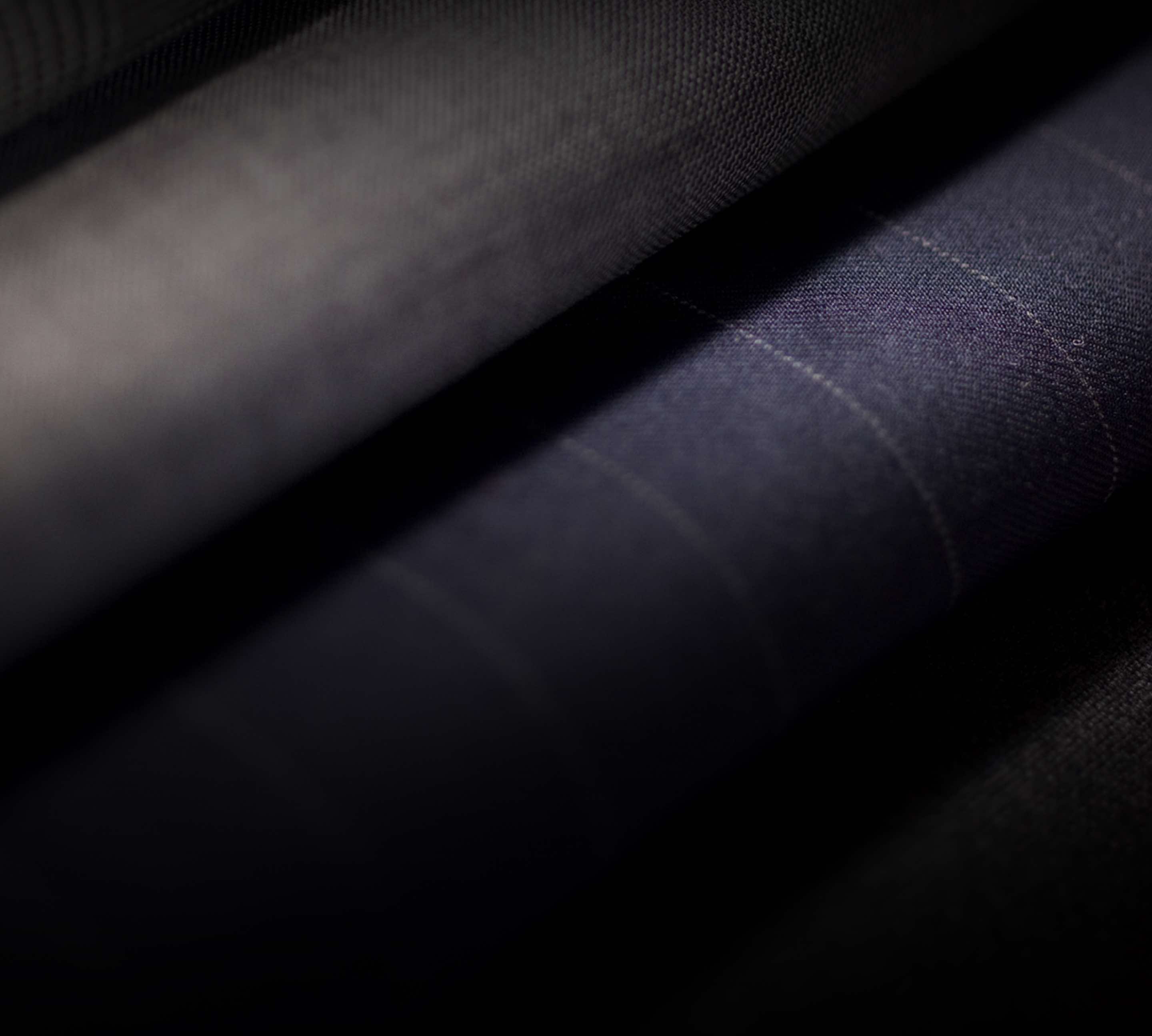Close-up of navy pinstripe fabric