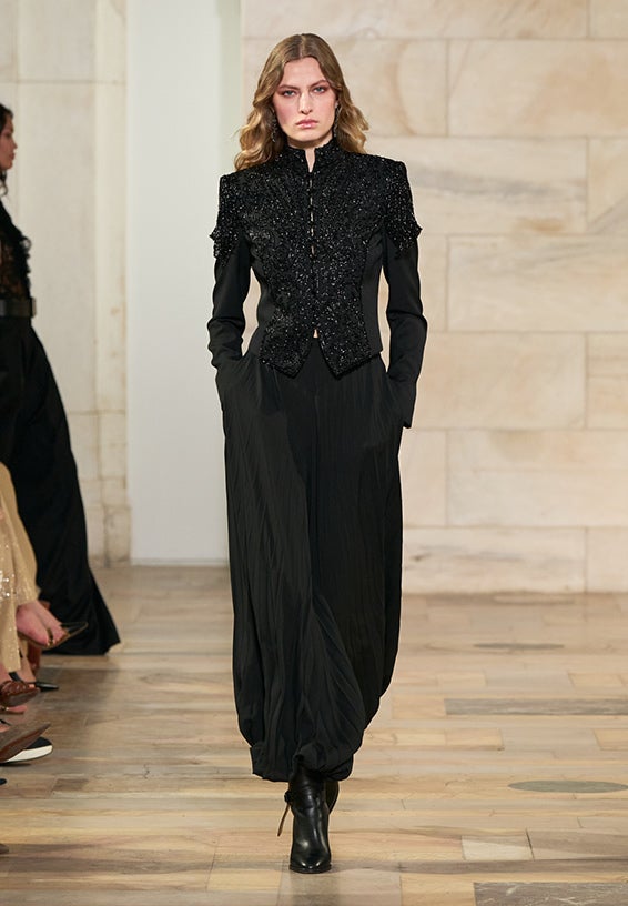 A look from Ralph Lauren’s Fall 2025 runway show shown on model.