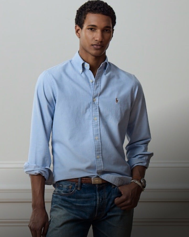 Man wears Classic Fit blue button-down shirt.
