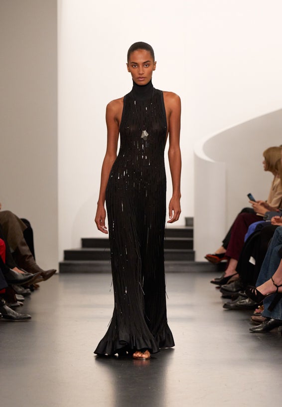 A look from Ralph Lauren’s Fall 2025 runway show shown on model.