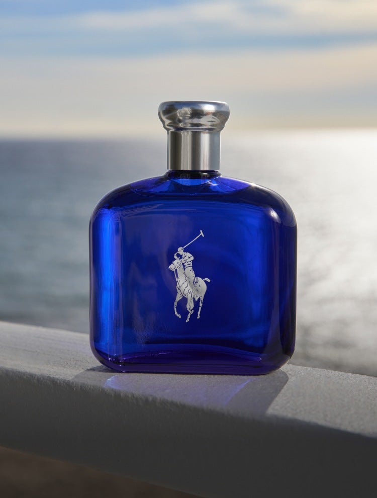 Blue fragrance bottle with silver cap.