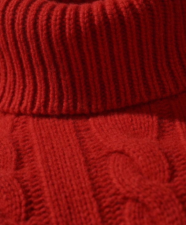 Red cable-knit beanie.