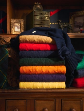 Navy down jacket with skier jacket at front.