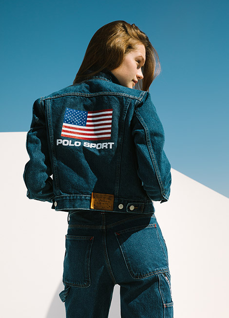 Woman in Polo  Sport  denim jacket with American flag motif 