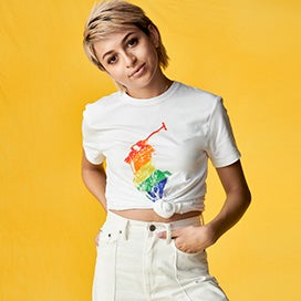 Josie Totah in knotted white tee with large rainbow Pony graphic