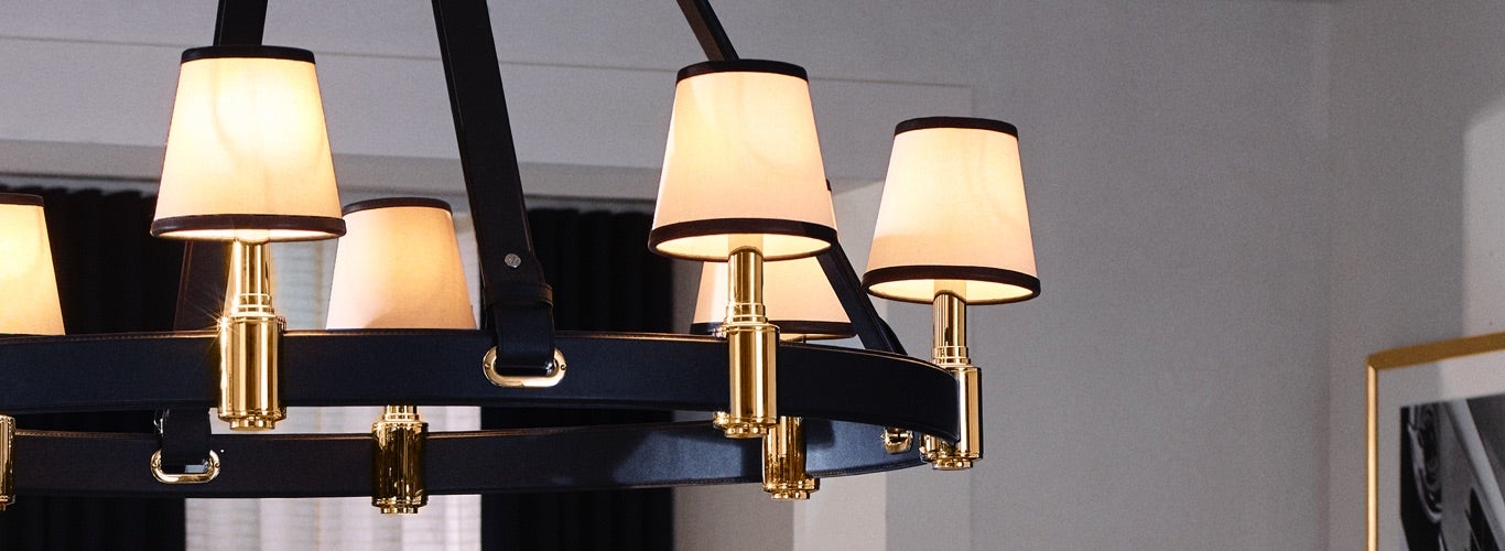 Sconce chandelier with black leather belt accents