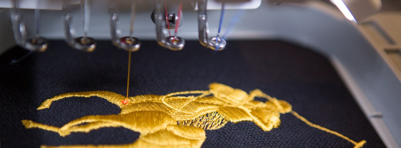 Close-up of golden embroidered Polo Pony