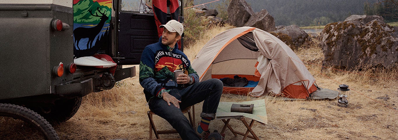 Video of a man at campsite in Great Outdoors apparel