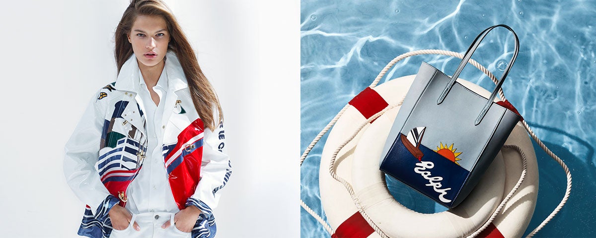 Woman in jacket with allover yacht graphic & sailboat tote bag