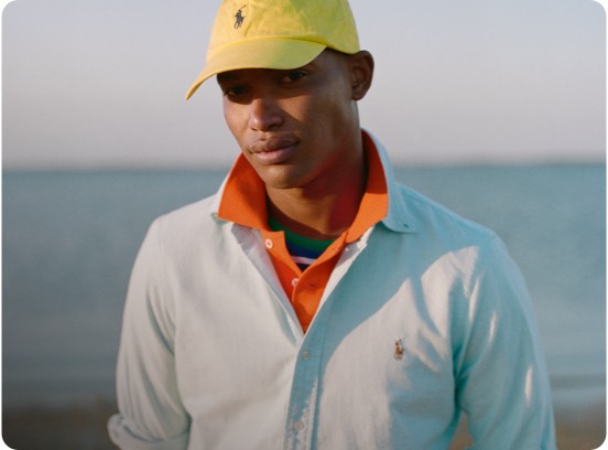 Man in button-down shirt with multicolored Polo Pony accent