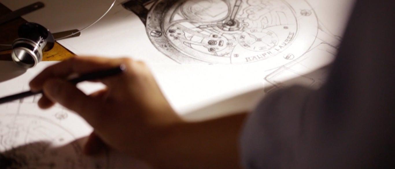 Photograph of designer sketching watch designs