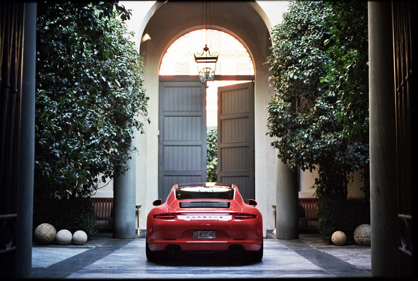 This spot reserved for Porsche-driving violin virtuosos: Charlie Siem’s orange 911 GTS, at the Ralph Lauren Palazzo in Milan