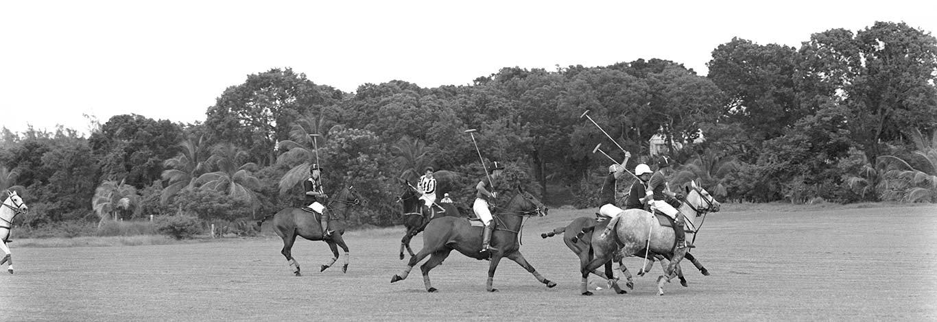 Greyscale image of polo match