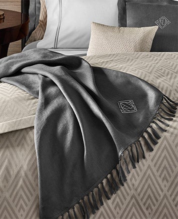 Dark grey blanket with fringe trim & monogram