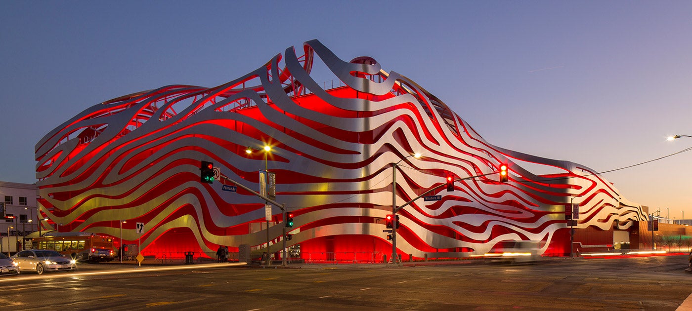 The newly renovated façade of the Petersen Automotive Museum channels automotive speed and power