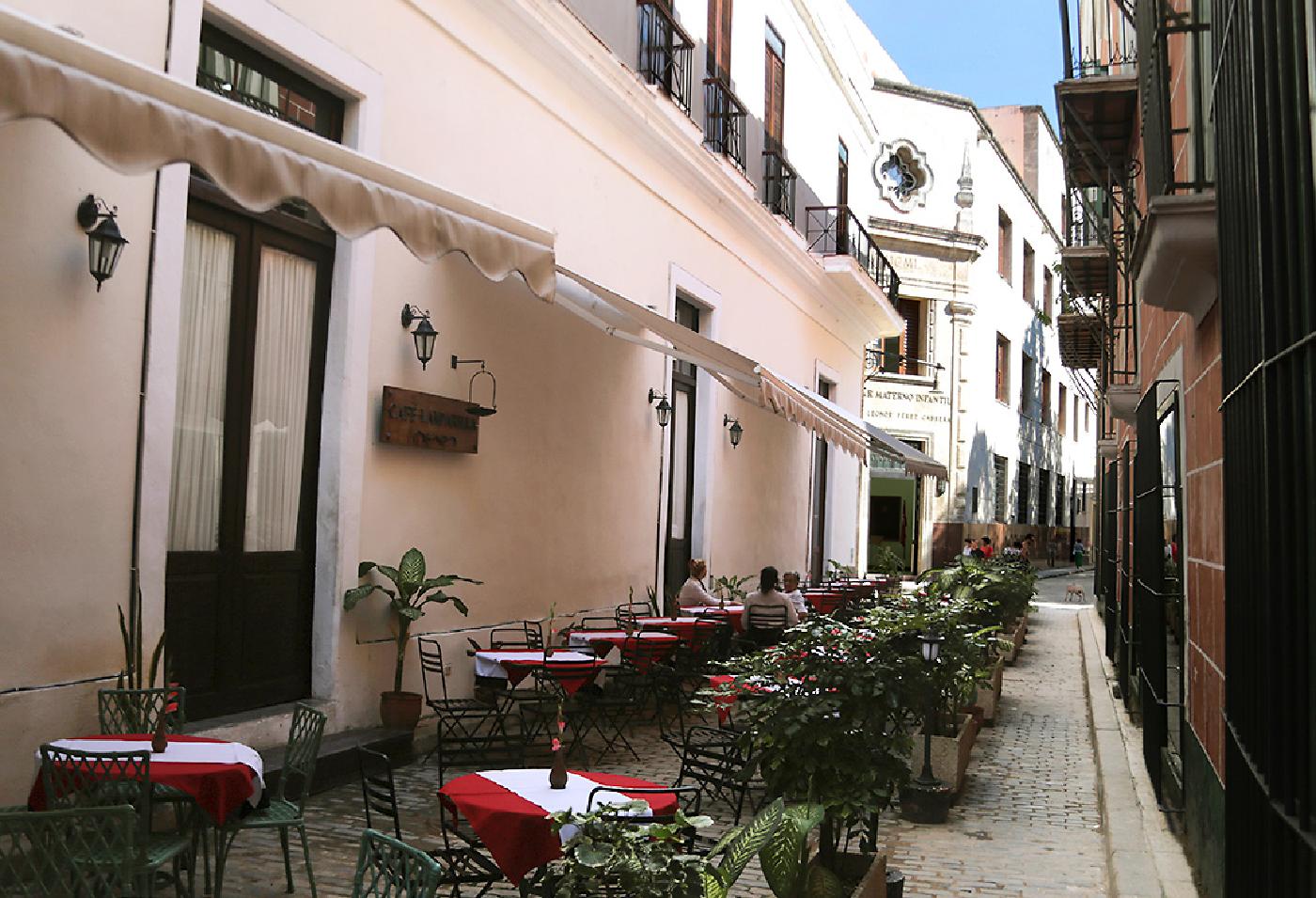Afternoons are lazy at Café Lamparilla, but at night musicians serenade passersby with renditions of classic Cuban songs