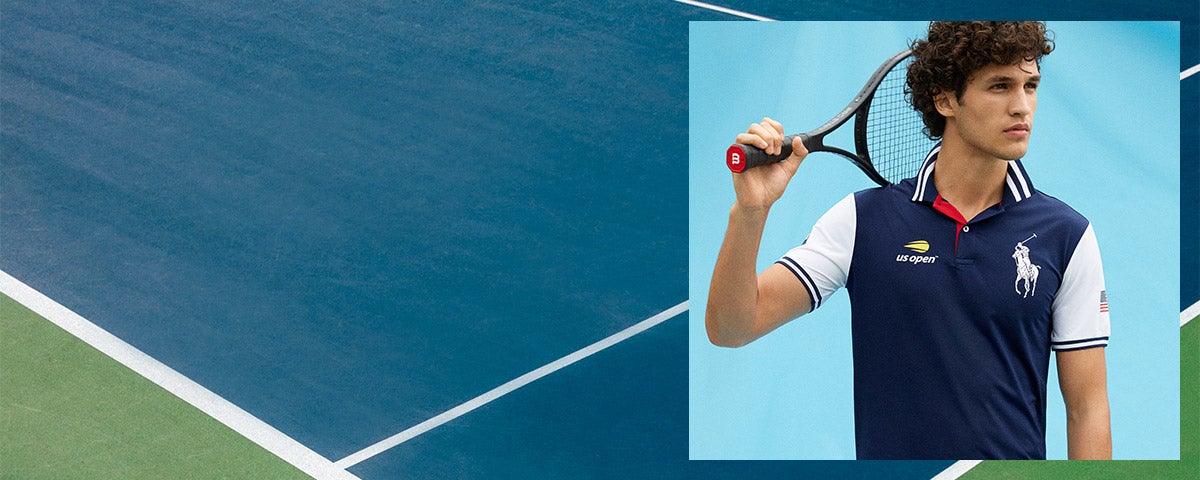 Tennis player in navy US Open Polo shirt with contrast white sleeves