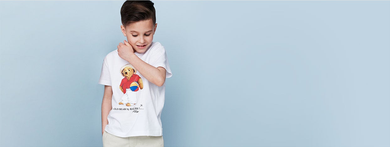 Boy wears Beach Ball Polo Bear T-shirt.