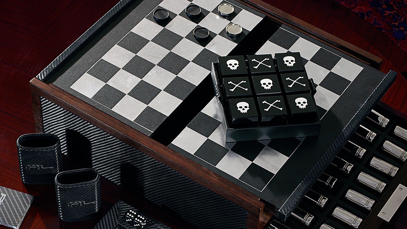 A harmonious contrast of walnut wood, carbon fiber and leather makes up many of the Ralph Lauren games