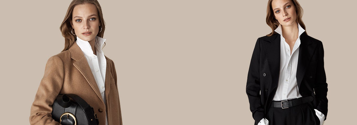 Woman in tan coat & button-down; woman in black blazer & button-down