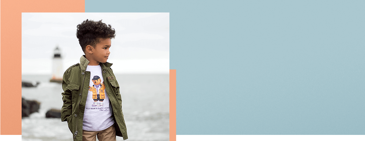 Boy wears Raincoat Polo Bear T-shirt and green jacket