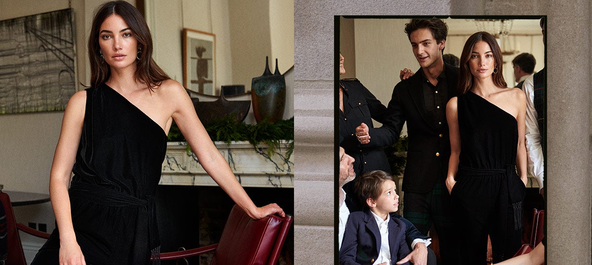 Woman in black velvet one-shoulder jumpsuit at holiday party