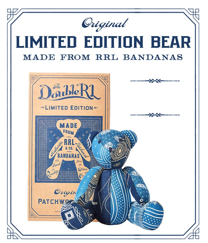 Stuffed teddy bear made with blue bandanna-print patchwork exterior