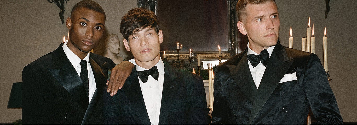 Three men in tuxedos and bow ties