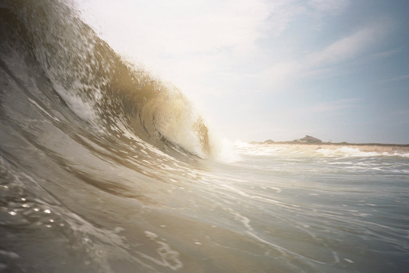 Nothing is more fun than sitting in the shore break—a childhood pastime that never gets old—shooting photos of crashing waves