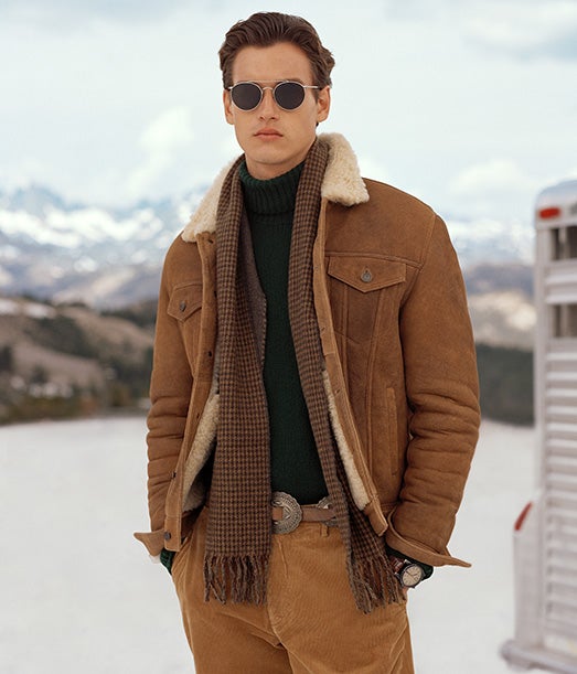 Man in shearling-lined tan suede jacket