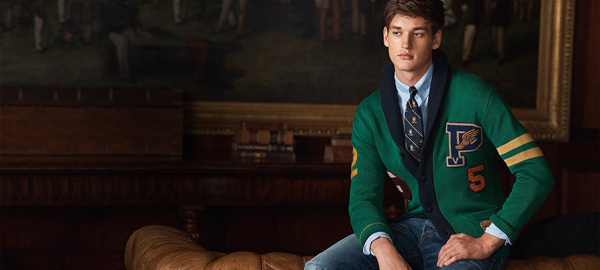 Man in Irish green cardigan with navy trim & contrast stripes
