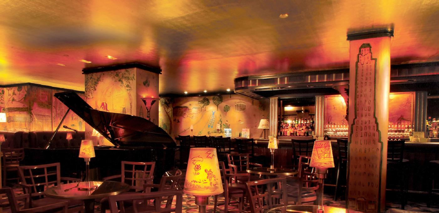 Bemelmans Bar, named after <em>Madeline</em> author and illustrator Ludwig Bemelmans, is lined with the artist’s murals