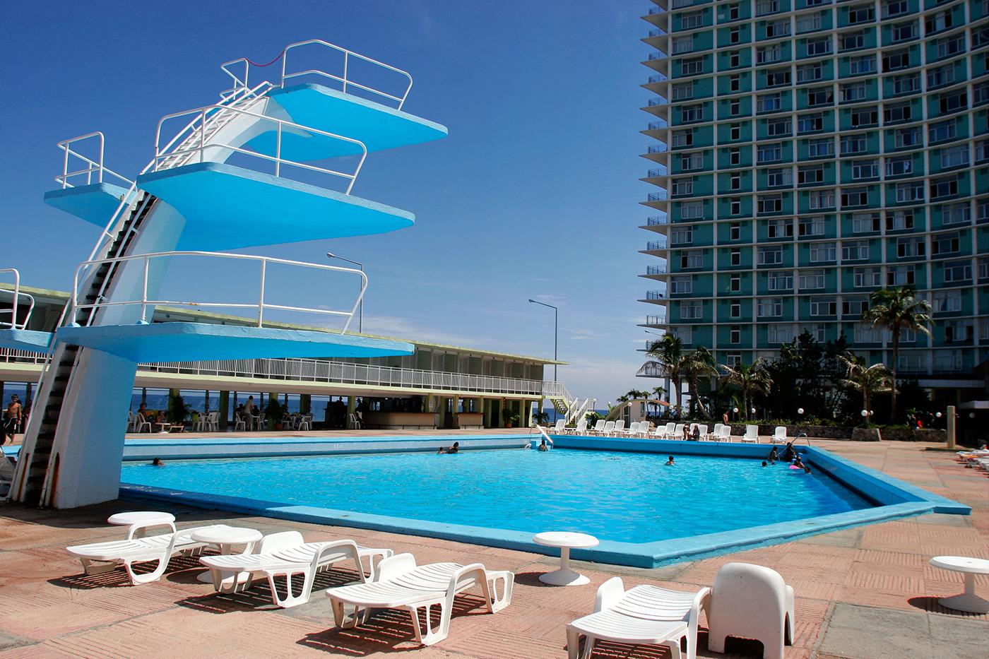                             Retro glamour and an old-school high dive make for an enjoyable afternoon hanging poolside at Hotel Habana Riviera